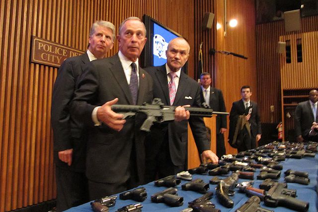Mayor Bloomberg, with Manhattan DA Cy Vance and Commissioner Ray Kelly, seemed reluctant to pick up the assault rifle